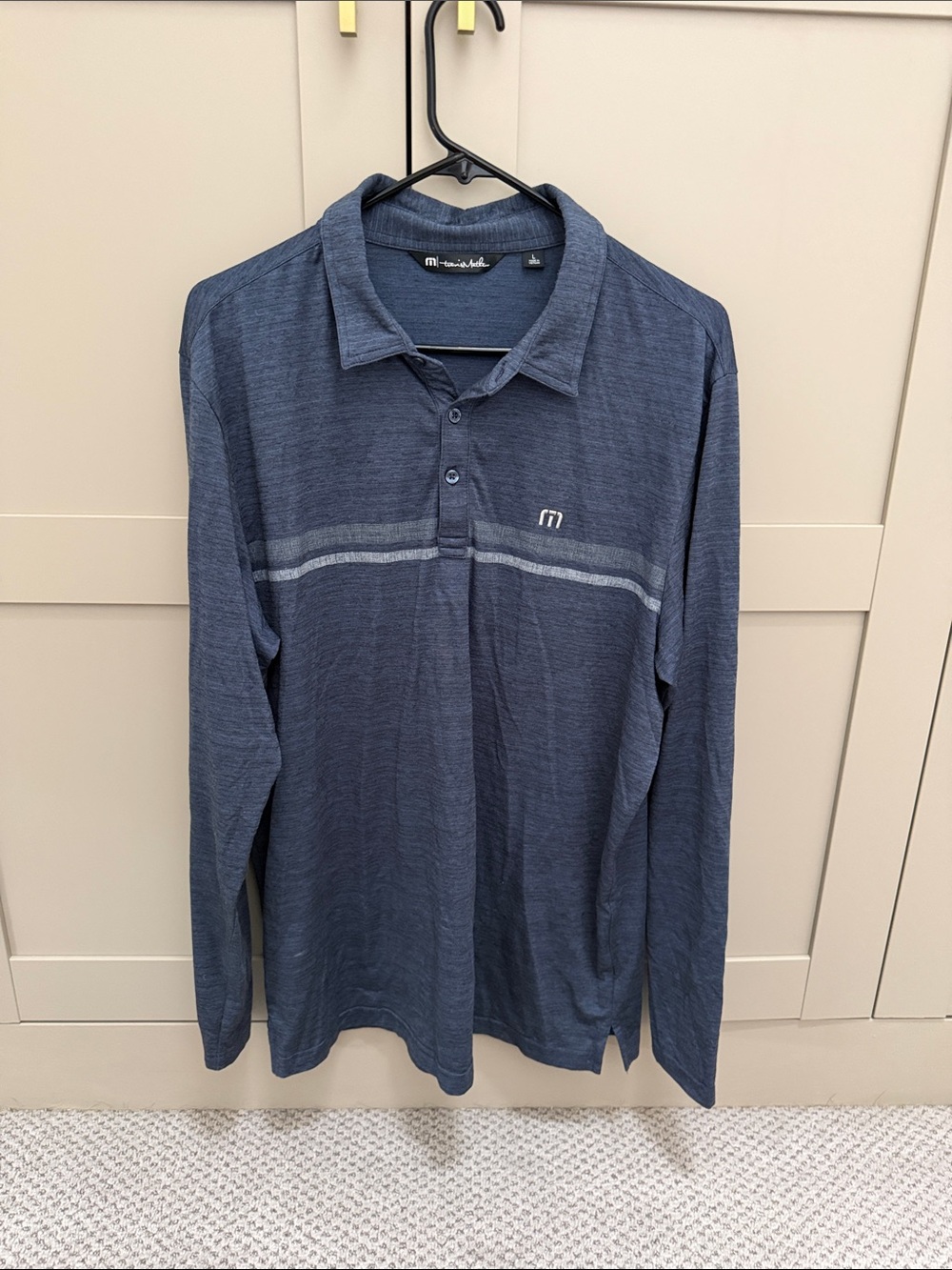 Travis Mathew Navy Long-Sleeve Polo with Light Gray Chest Stripe